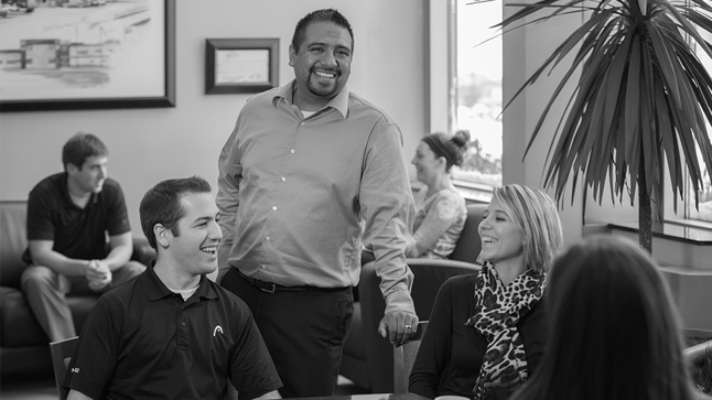 Three Logistics Sales Representatives Talking